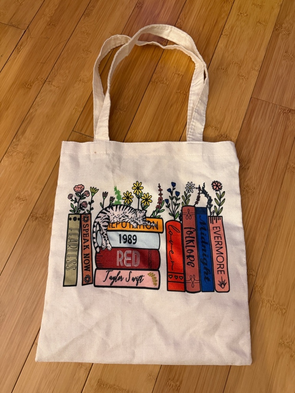 Canvas Bookstack Tote Bag in Cream with Colorful Print - Taylor Swift album name